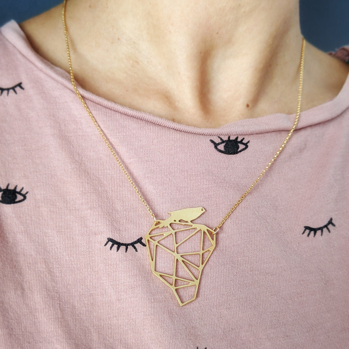 bird on rock necklace